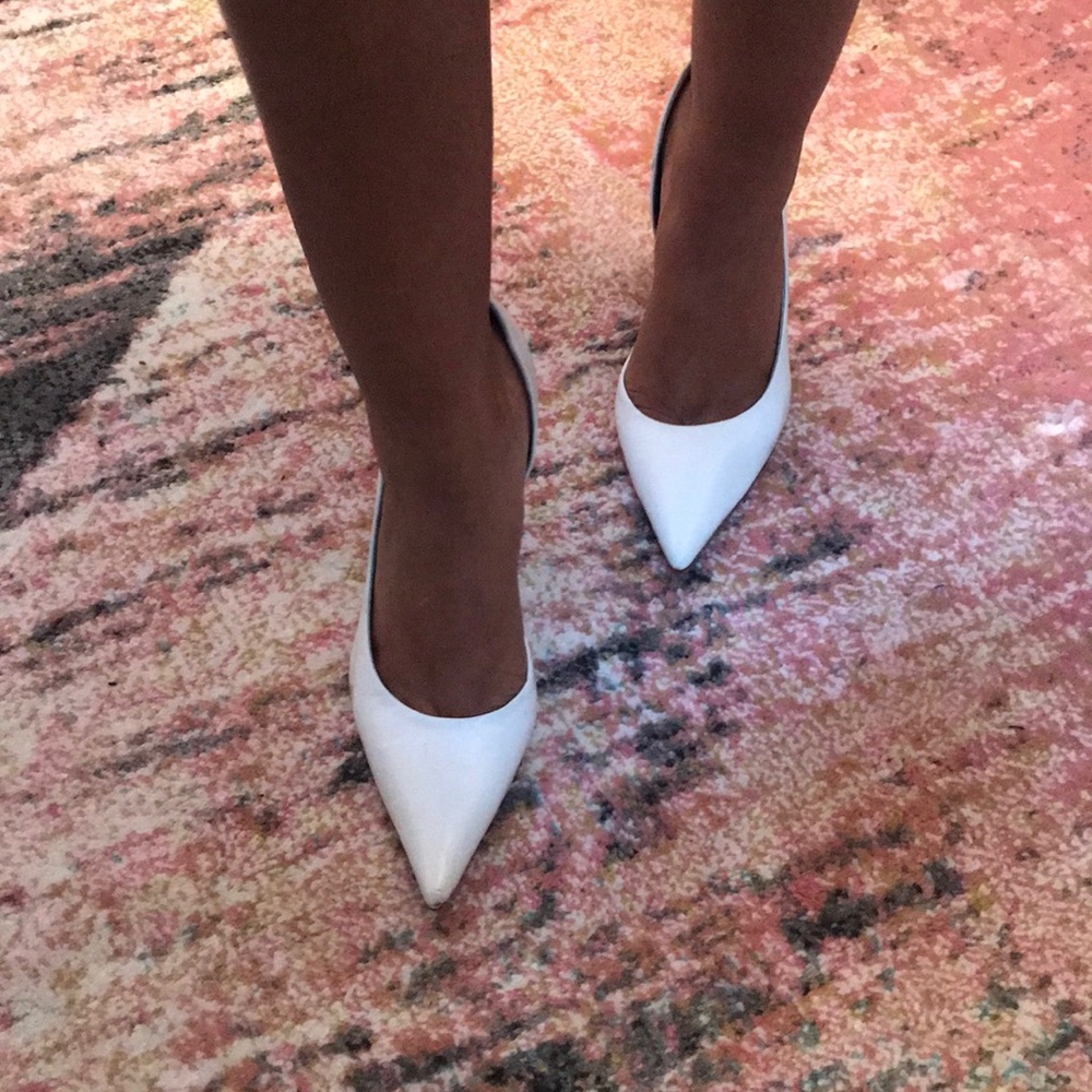 White leather stiletto pumps